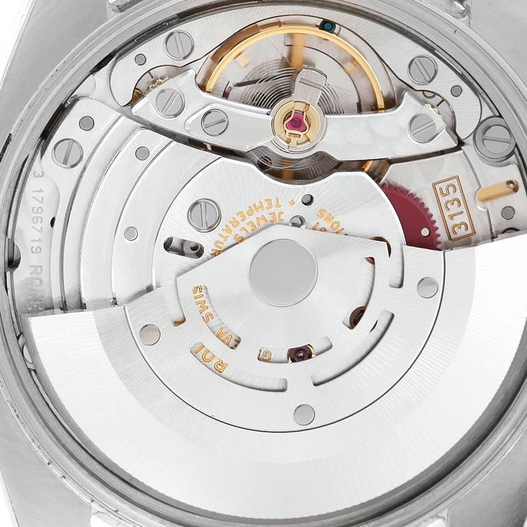 This image shows the movement mechanism and internal components of a Rolex Date 115210 Men's Stainless Steel Blue Dial 115210 Men's Stainless Steel Blue Dial model watch from the back side.