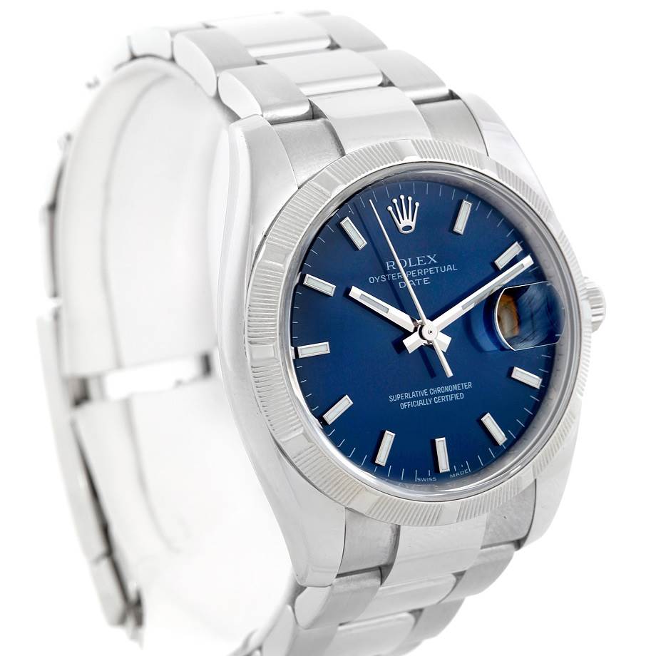 The image shows a Rolex Date 115210 Men's Stainless Steel Blue Dial 115210 Men's Stainless Steel Blue Dial model watch at a three-quarter angle, highlighting the bracelet, case, and dial with the date feature.