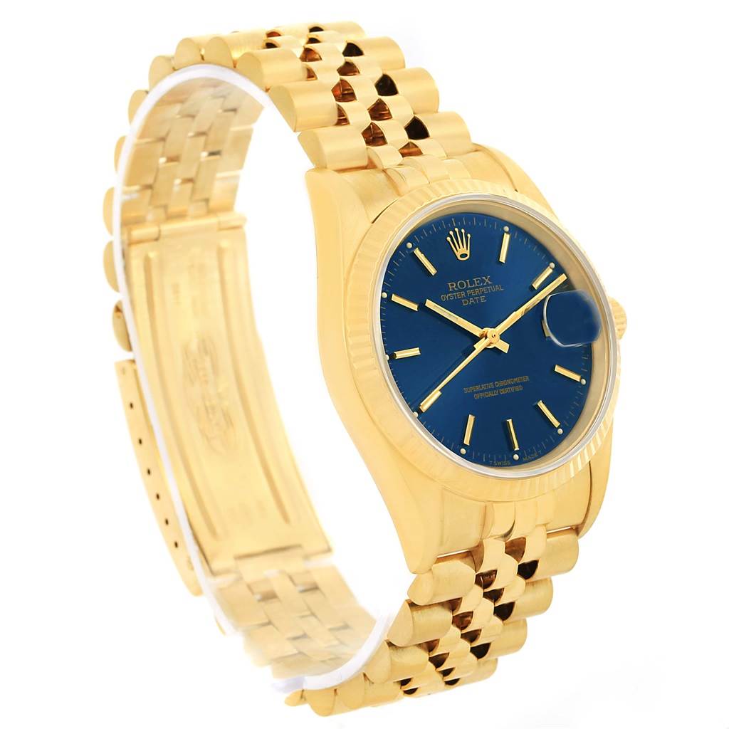 The image shows a side angle of a Rolex Date 15238 Men's Yellow Gold Blue Dial 15238 Men's Yellow Gold Blue Dial model watch, highlighting its gold bracelet, blue dial, and date window.