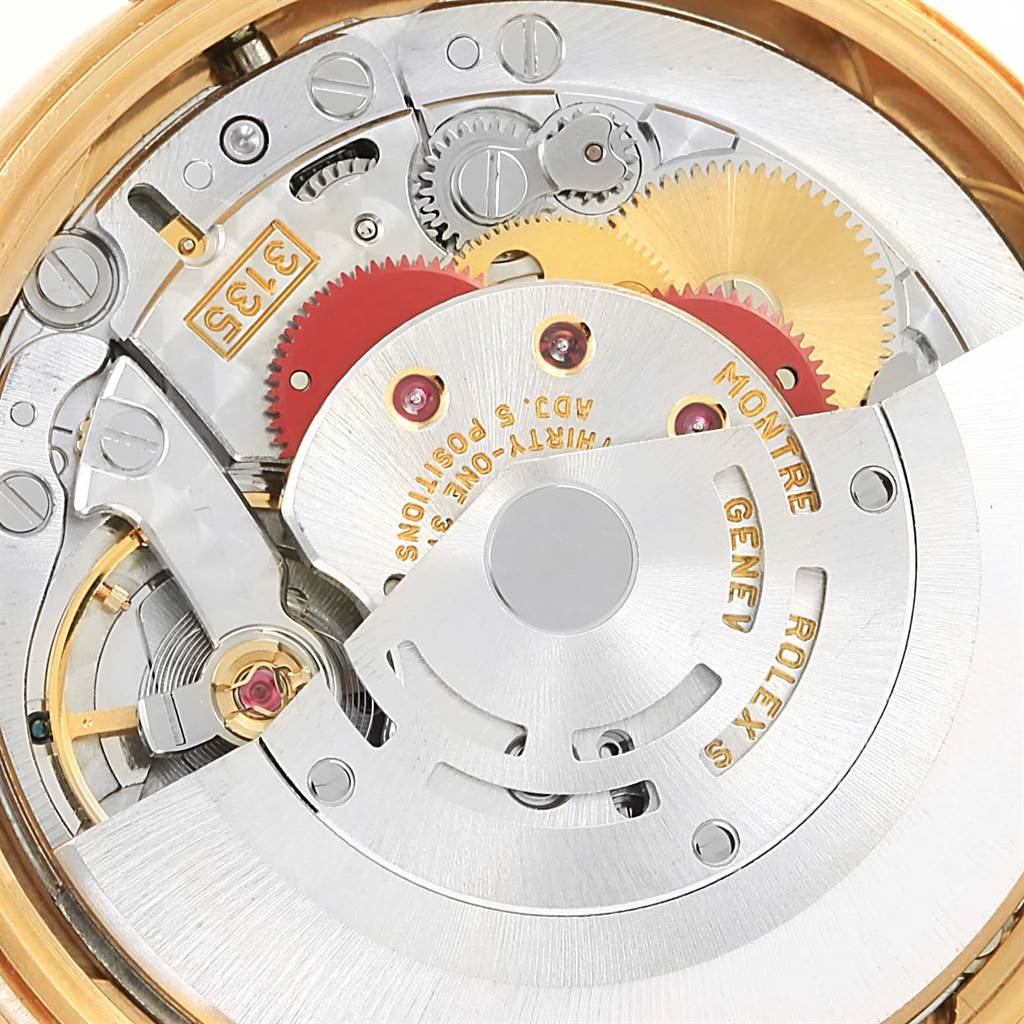 This image shows a close-up view of the inner mechanism and gears of a Rolex Date 15238 Men's Yellow Gold Blue Dial 15238 Men's Yellow Gold Blue Dial model watch.