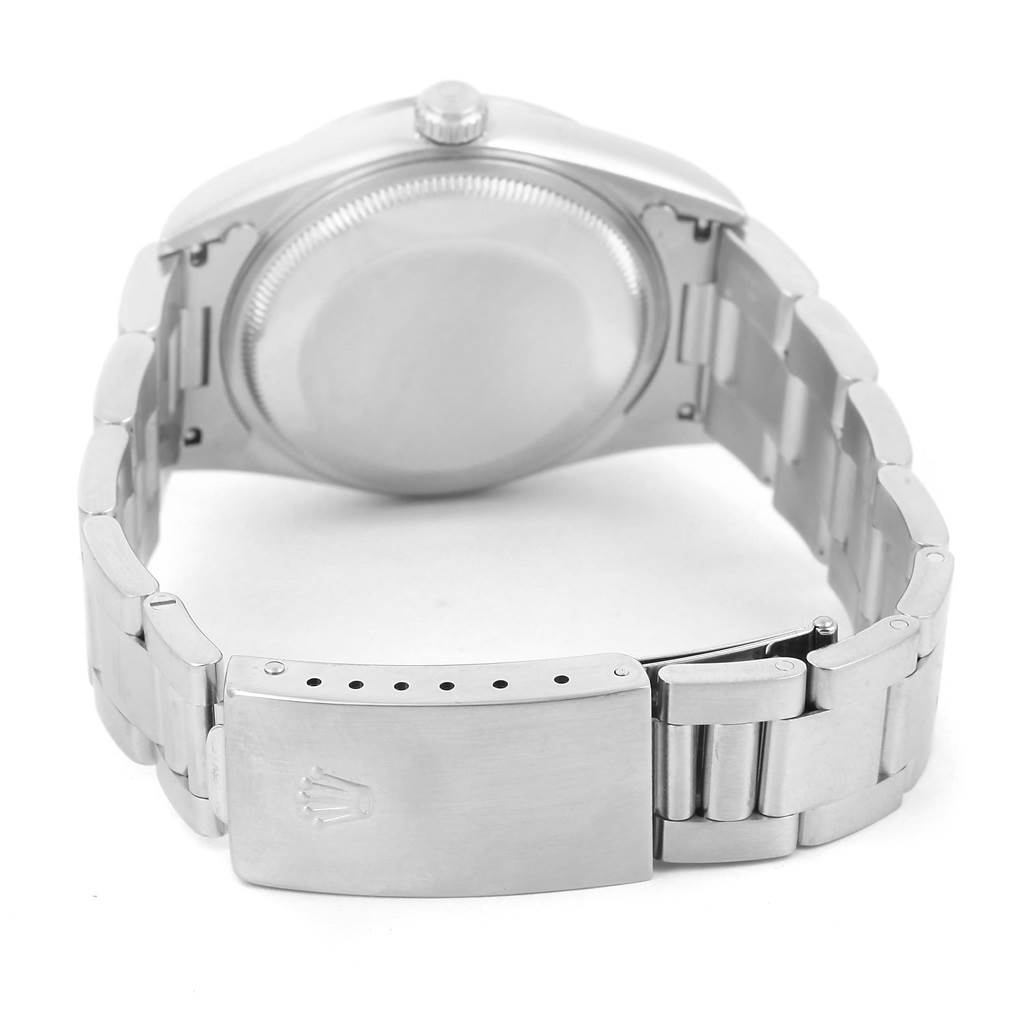 The image shows the back and clasp of a Rolex Date 15200 Men's Stainless Steel Black Dial 15200 Men's Stainless Steel Black Dial model watch, highlighting the case back and bracelet.