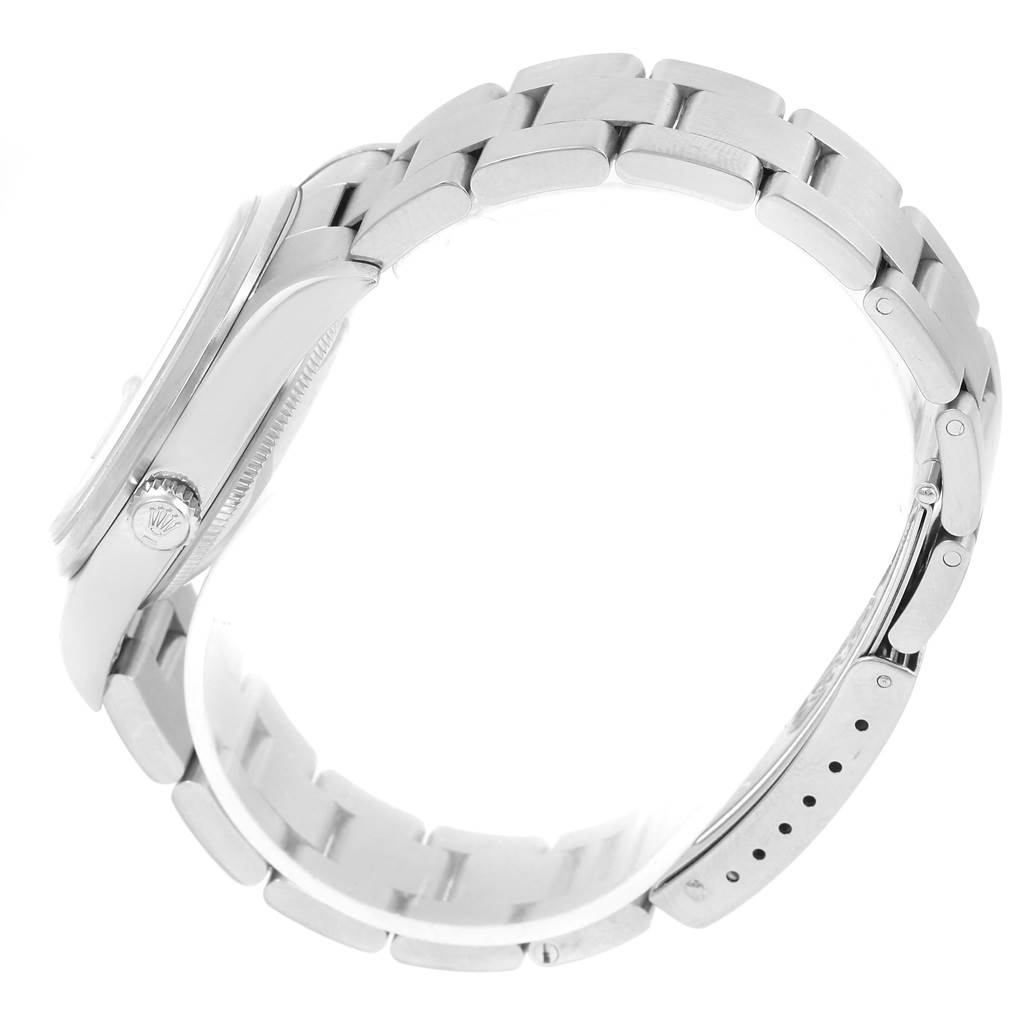 The image shows a side view of a Rolex Date 15200 Men's Stainless Steel White Dial 15200 Men's Stainless Steel White Dial model watch, highlighting the crown, case, and bracelet.