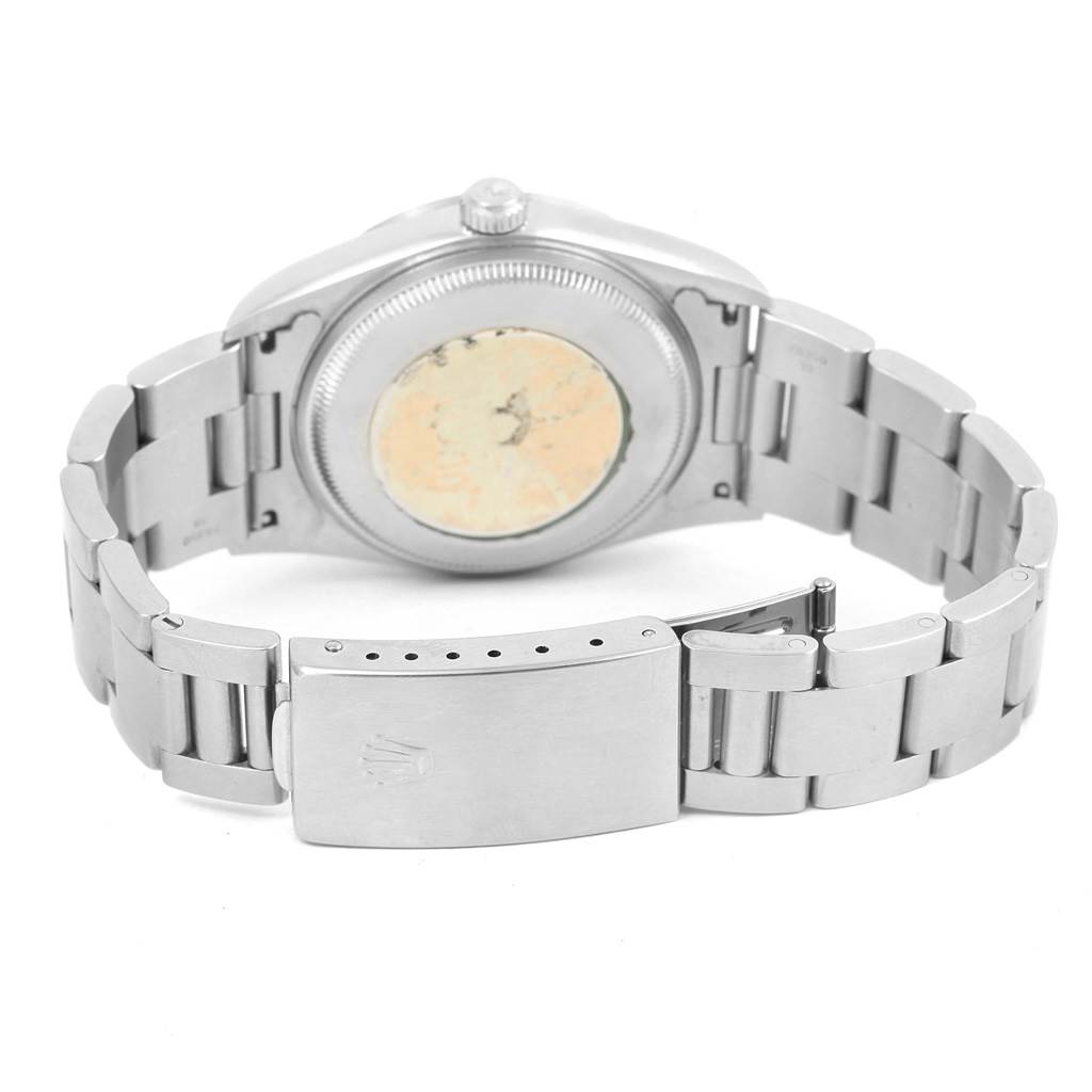 The image shows the back view of a Rolex Date 15200 Men
s Stainless Steel Silver Dial 15200 Men
s Stainless Steel Silver Dial model watch, highlighting the case back and bracelet clasp.