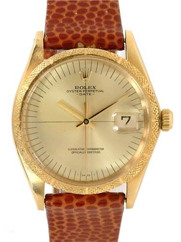 This image shows a front view of a Rolex Date 1510 Men's Yellow Gold Champagne Dial 1510 Men's Yellow Gold Champagne Dial model watch, highlighting the dial, gold-tone case, and textured brown leather strap.