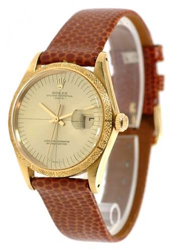 This image shows a Rolex Date 1510 Men's Yellow Gold Champagne Dial 1510 Men's Yellow Gold Champagne Dial model watch viewed at a three-quarter angle, highlighting the dial, bezel, crown, and leather strap.