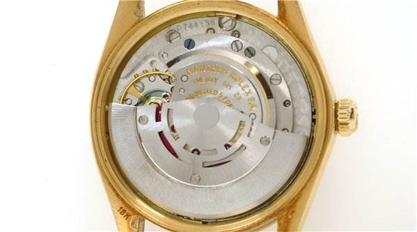 The image shows the inner movement mechanism of a Rolex Date 1510 Men's Yellow Gold Champagne Dial 1510 Men's Yellow Gold Champagne Dial model watch, viewed from the back.