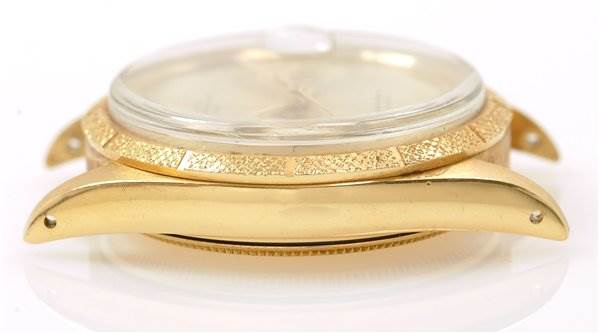 The image shows a side view of a Rolex Date 1510 Men's Yellow Gold Champagne Dial 1510 Men's Yellow Gold Champagne Dial model watch, highlighting the case, bezel, and lugs.