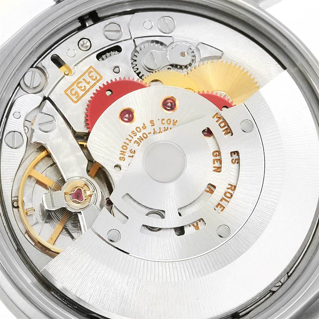 This close-up image shows the movement and inner mechanism of a Rolex Date 15210 Men's Stainless Steel Silver Dial 15210 Men's Stainless Steel Silver Dial model watch.