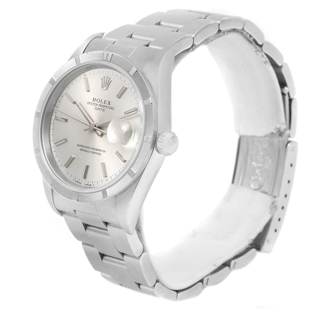 This is a side view of a Rolex Date 15210 Men's Stainless Steel Silver Dial 15210 Men's Stainless Steel Silver Dial model watch showcasing the face, bezel, crown, and bracelet.