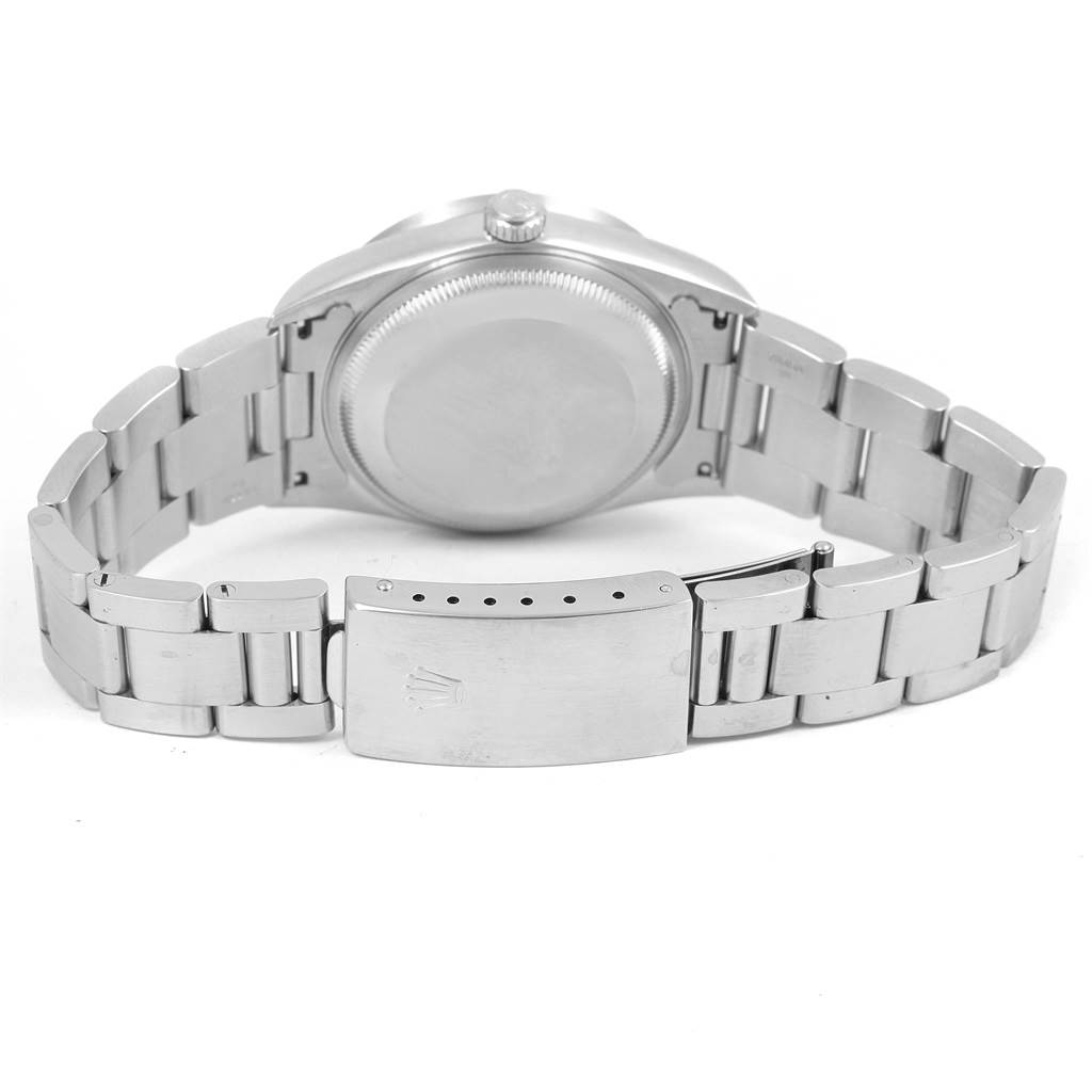 The image shows the back angle of a Rolex Date 15210 Men's Stainless Steel White Dial 15210 Men's Stainless Steel White Dial model watch, displaying its case back and bracelet with clasp.