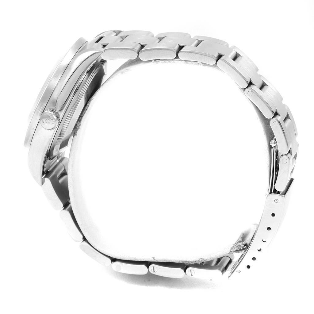 The image shows a side view of the Rolex Date 15210 Men's Stainless Steel White Dial 15210 Men's Stainless Steel White Dial model watch, highlighting the case and metal bracelet.