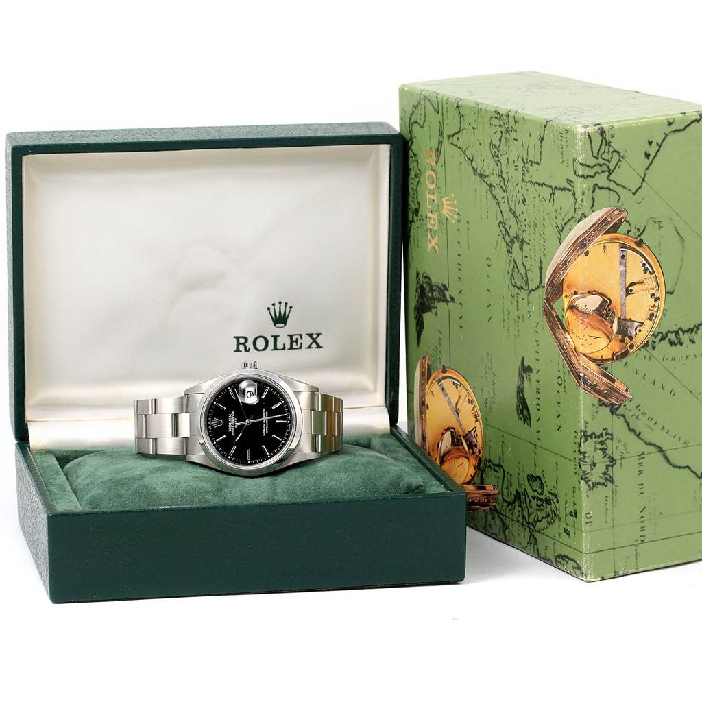 The Rolex Date 15200 Men's Stainless Steel Black Dial 15200 Men's Stainless Steel Black Dial model watch is shown from the front, resting in an open green box with the Rolex logo visible.