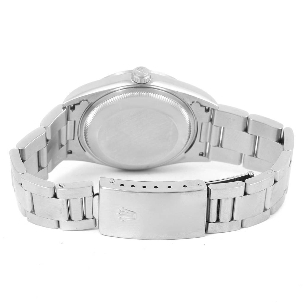 The image shows the back and bracelet of a Rolex Date 15200 Men's Stainless Steel Black Dial 15200 Men's Stainless Steel Black Dial model watch, including the clasp and case back.