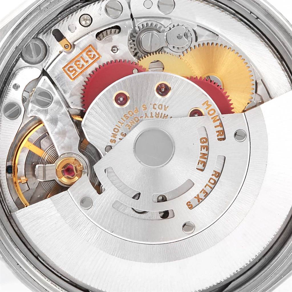 The image shows the movement mechanism of a Rolex Date 15200 Men's Stainless Steel Black Dial 15200 Men's Stainless Steel Black Dial model watch, highlighting gears and the rotor.