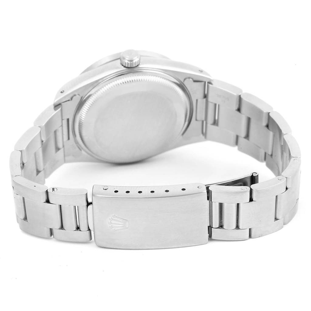 The image shows the back case and clasp of a Rolex Date 15210 Men's Stainless Steel Silver Dial 15210 Men's Stainless Steel Silver Dial model watch, viewed from the rear angle.