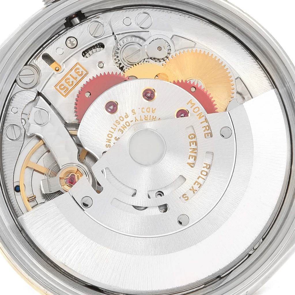 The image shows a close-up view of the movement mechanism of a Rolex Date 15223 Men's Steel and Gold (two tone) Silver Dial 15223 Men's Steel and Gold (two tone) Silver Dial model watch.