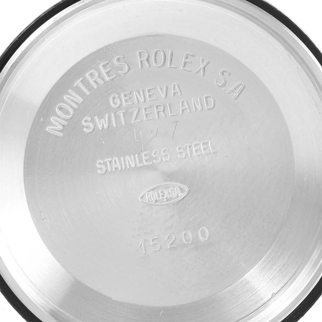 This image shows the inside of the case back of a Rolex Date 15223 Men's Steel and Gold (two tone) Silver Dial 15223 Men's Steel and Gold (two tone) Silver Dial watch, displaying model information and material details.