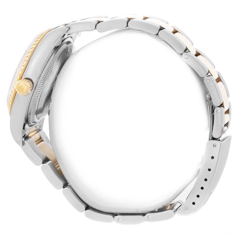 The image shows a side profile and partial view of the bracelet of a Rolex Date 15223 Men's Steel and Gold (two tone) Silver Dial 15223 Men's Steel and Gold (two tone) Silver Dial model watch.
