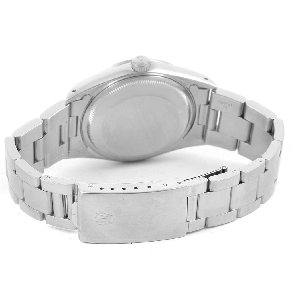 The image shows the back case and bracelet of a Rolex Date 15200 Men's Stainless Steel Silver Dial 15200 Men's Stainless Steel Silver Dial model watch from a rear angle.