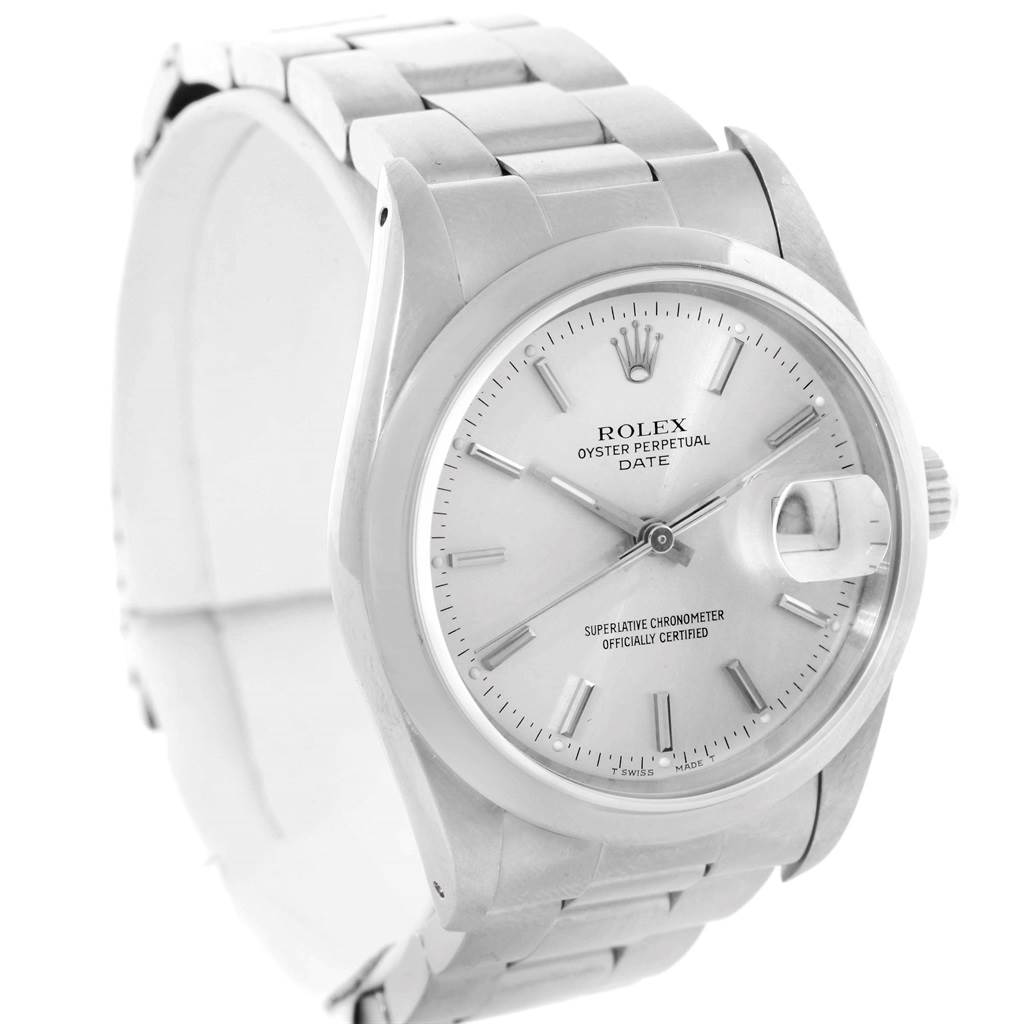 The image shows a close-up, front angle of a Rolex Oyster Perpetual Date watch, including the dial, bezel, and bracelet.