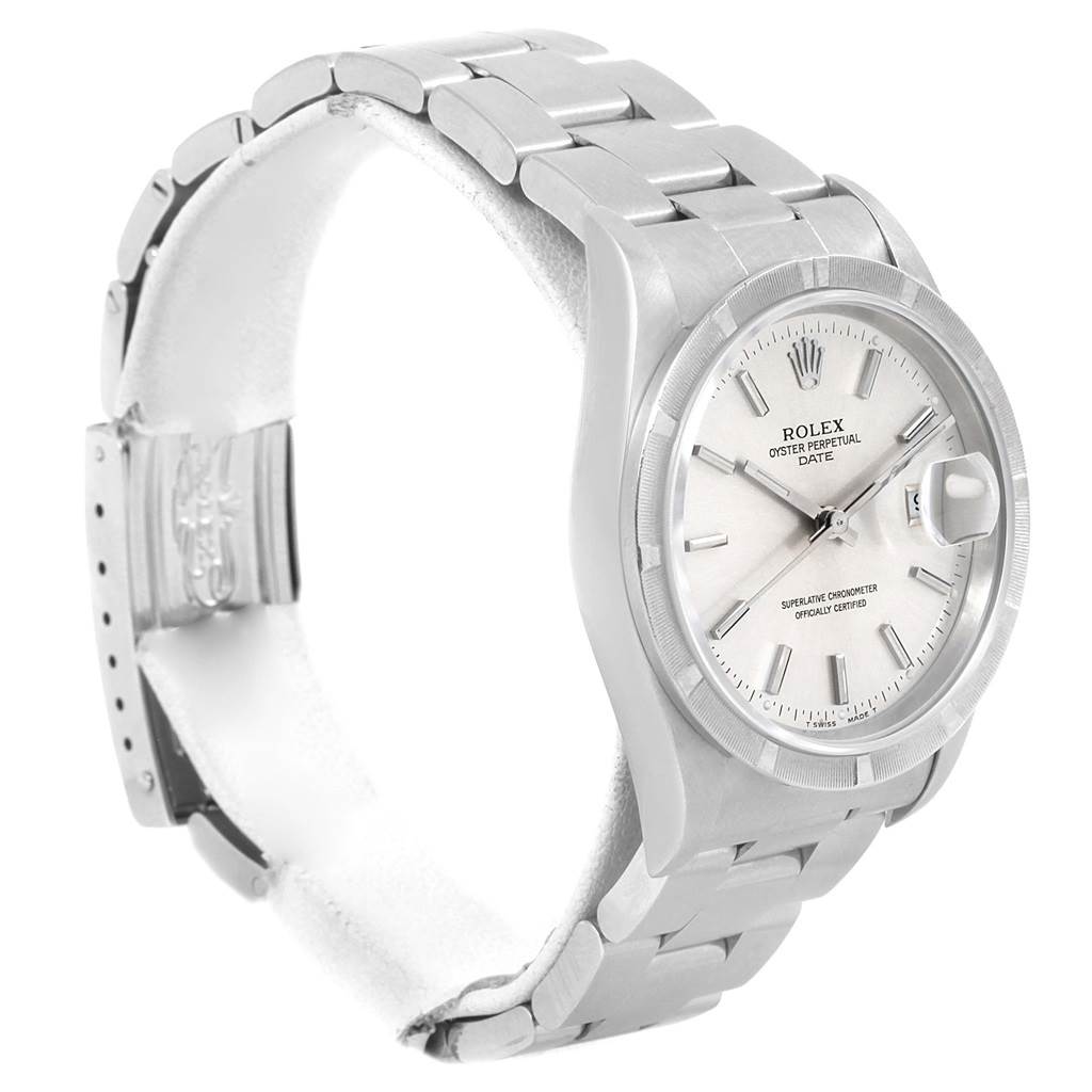 The Rolex Date 15210 Men's Stainless Steel Silver Dial 15210 Men's Stainless Steel Silver Dial model is shown at a slight angle, displaying the watch face, bracelet, and partially open clasp.