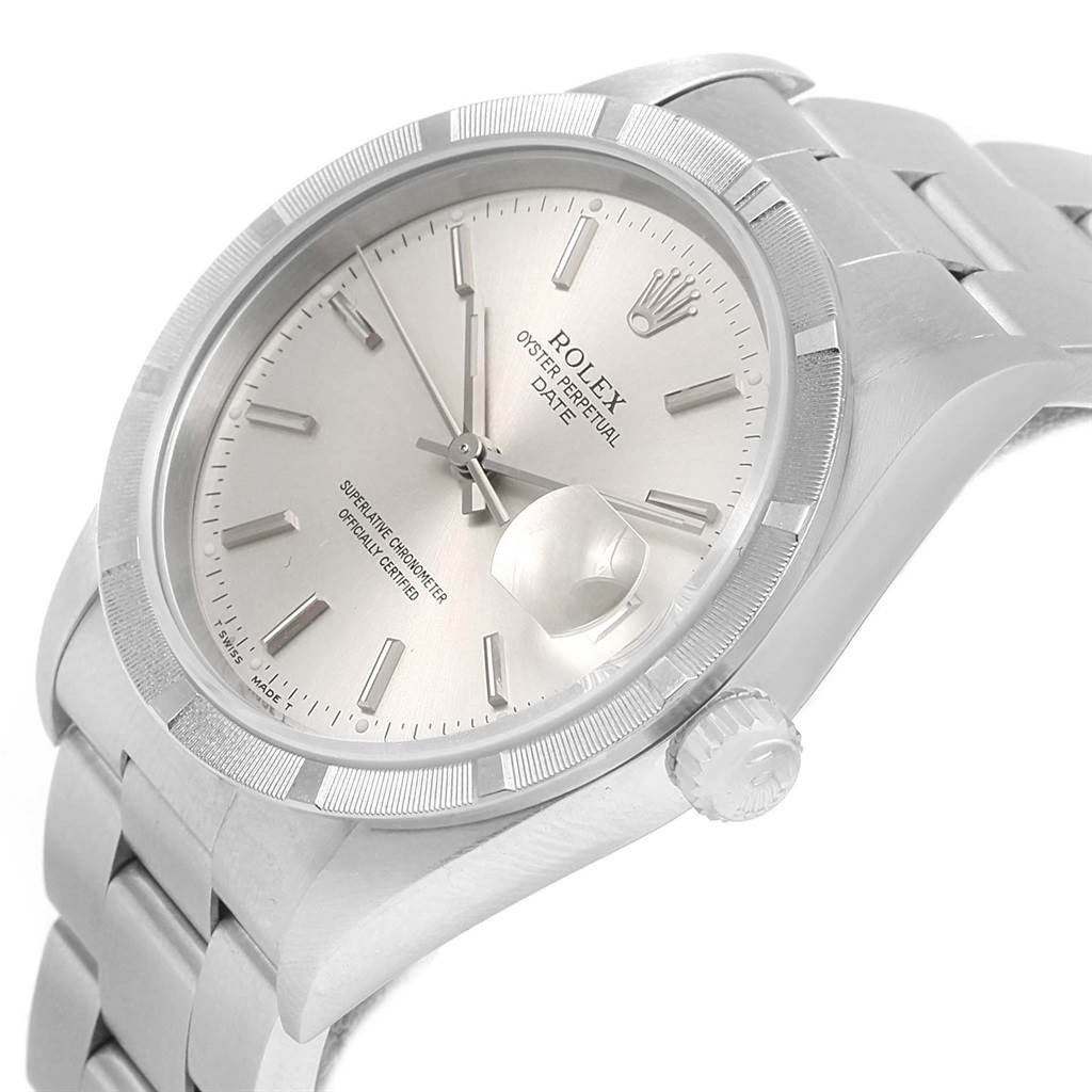 The image shows a close-up angled view of the Rolex Date 15210 Men's Stainless Steel Silver Dial 15210 Men's Stainless Steel Silver Dial model watch, featuring its dial, crown, and bracelet.