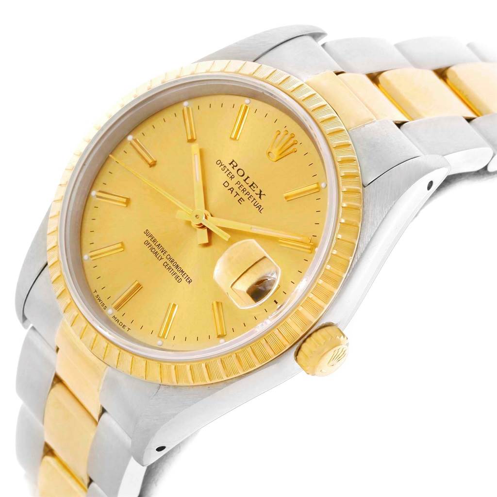 This image shows a close-up angle of a Rolex Date 15223 Men's Steel and Gold (two tone) Champagne Dial 15223 Men's Steel and Gold (two tone) Champagne Dial model, highlighting the watch face, bezel, and part of the bracelet.