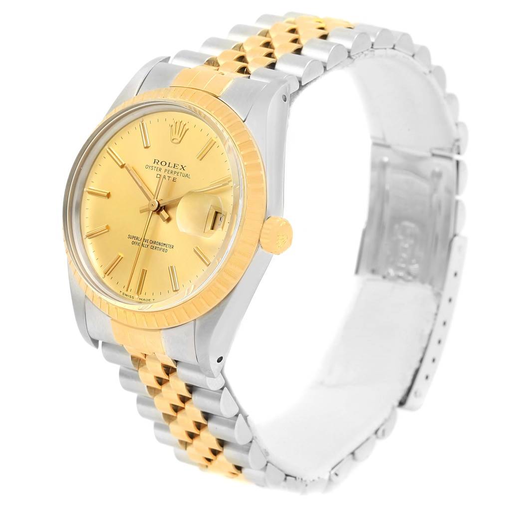 This image shows a Rolex Date 15053 Men's Steel and Gold (two tone) Champagne Dial 15053 Men's Steel and Gold (two tone) Champagne Dial model watch from a three-quarter angle, highlighting its gold dial, bezel, and two-tone bracelet.