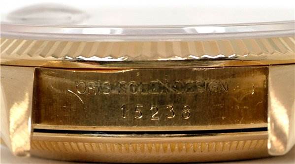 This image shows the side view of a Rolex Date 15238 Men's Yellow Gold Blue Dial 15238 Men's Yellow Gold Blue Dial model watch, focusing on the casing with the engraved model number 15238.