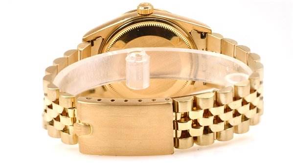 This is a rear view of a Rolex Date 15238 Men's Yellow Gold Blue Dial 15238 Men's Yellow Gold Blue Dial model watch showing its case back, crown, and bracelet.