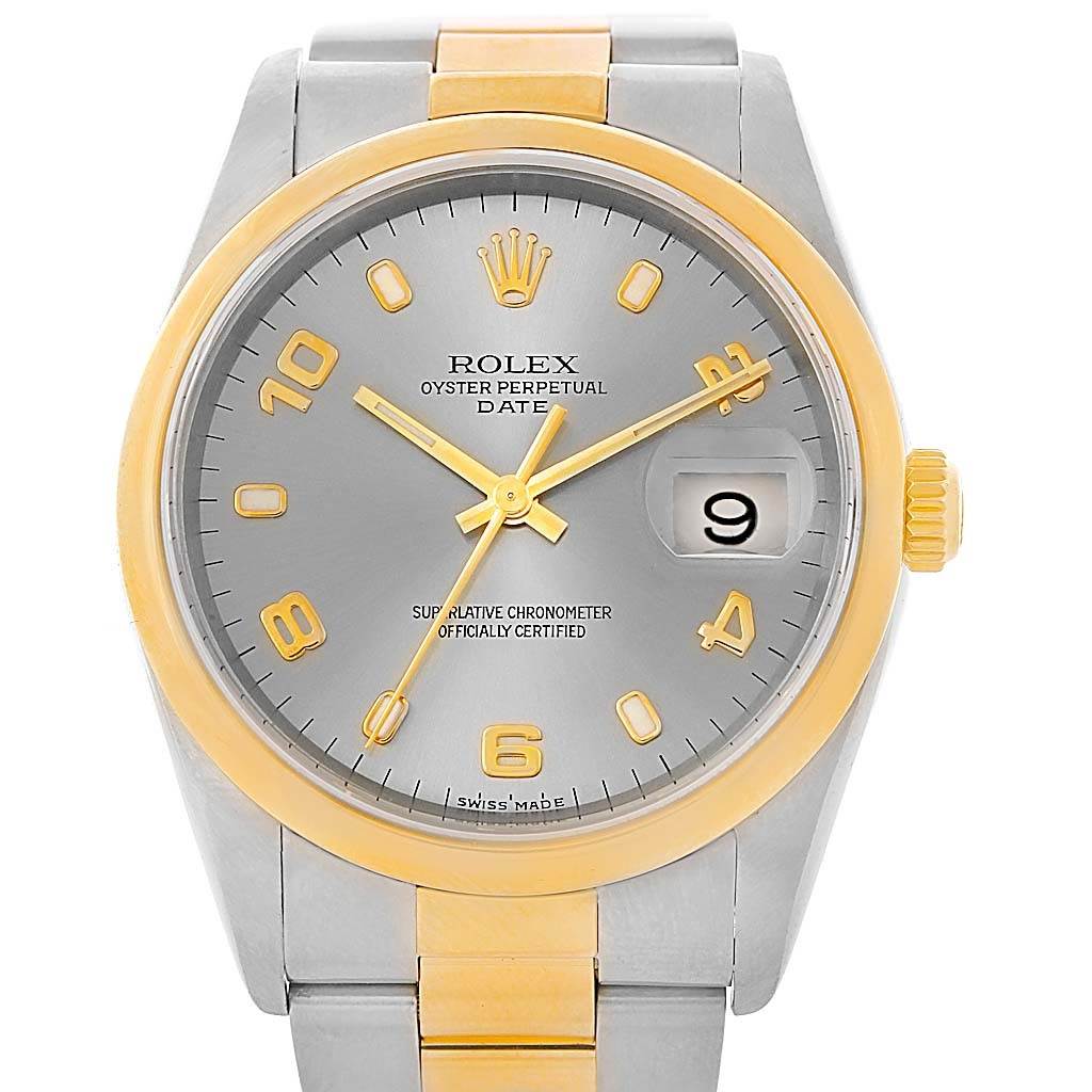 The Rolex Date 15203 Men's Steel and Gold (two tone) Grey Dial 15203 Men's Steel and Gold (two tone) Grey Dial model is shown from the front, displaying the dial, bezel, and bracelet.
