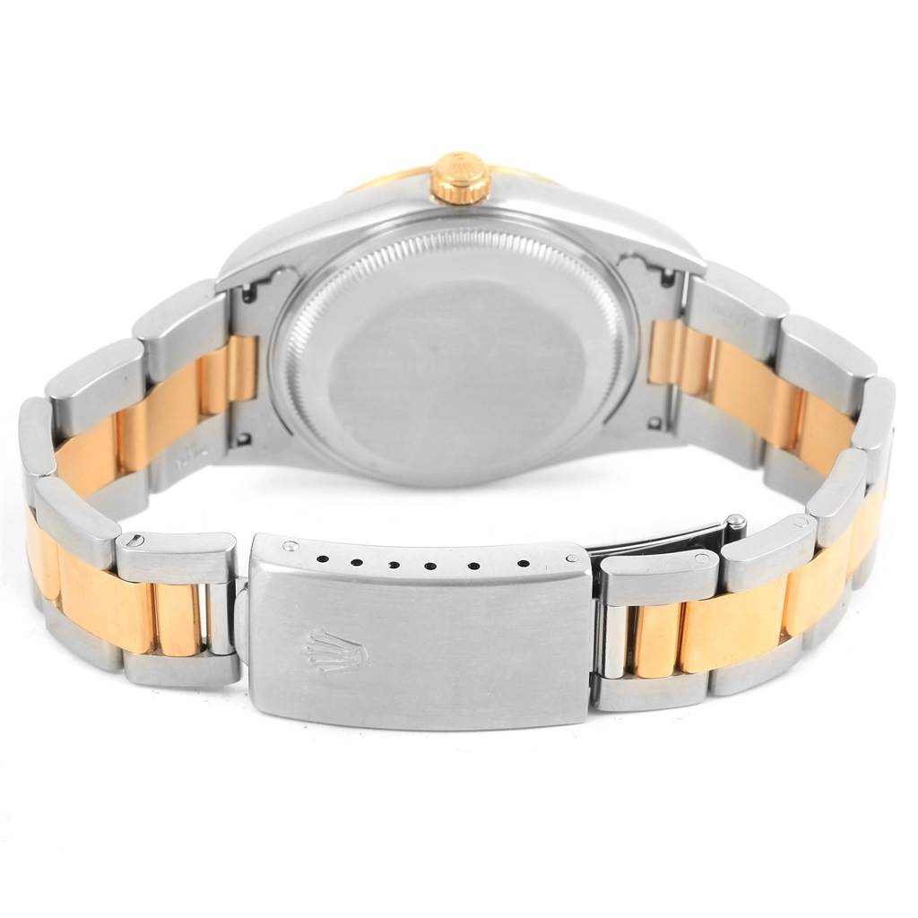 This image shows the back case, bracelet, and clasp of a Rolex Date 15223 Men's Steel and Gold (two tone) Champagne Dial 15223 Men's Steel and Gold (two tone) Champagne Dial model watch from a rear angle.