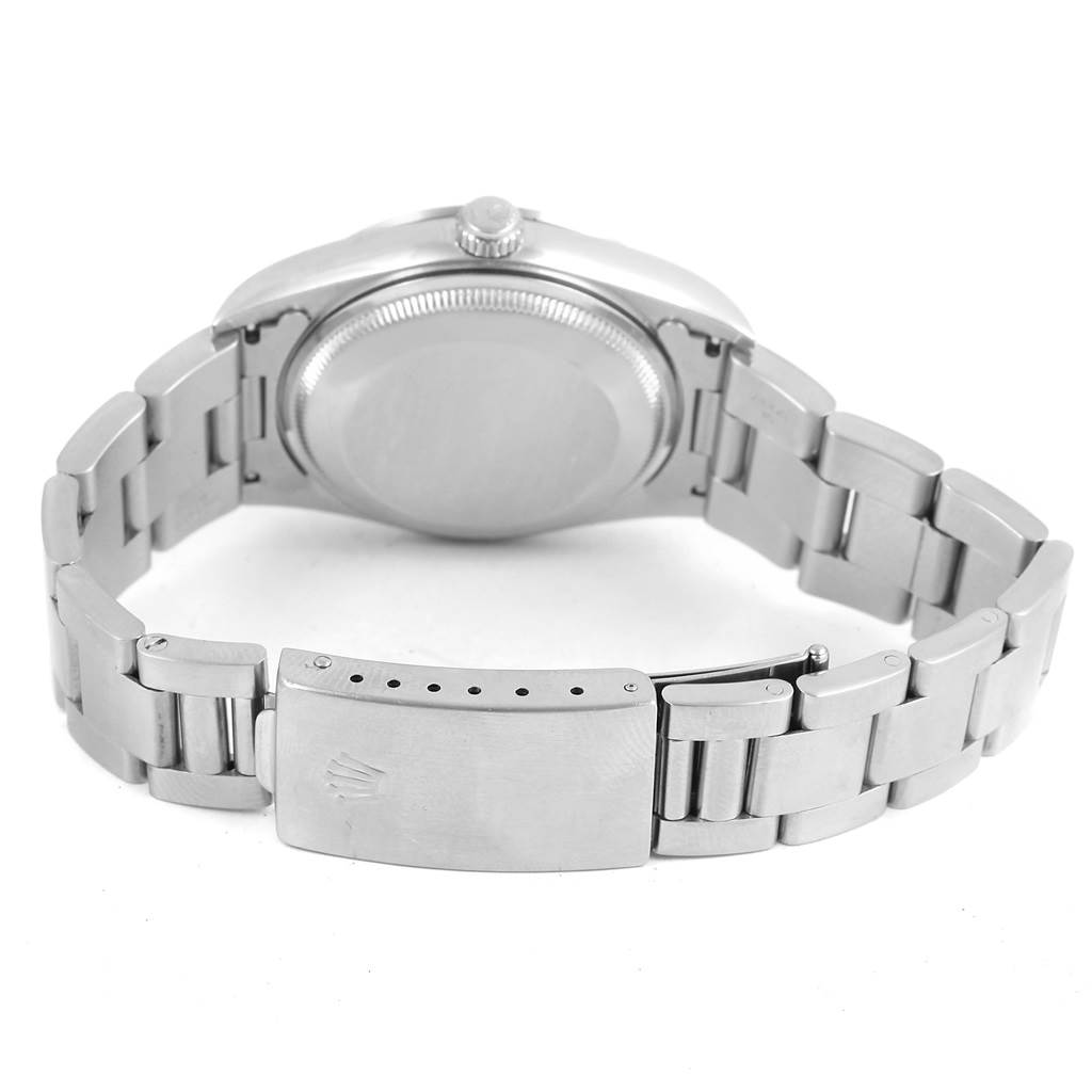 The image shows the back view of a Rolex Date 15200 Men's Stainless Steel Blue Dial 15200 Men's Stainless Steel Blue Dial model watch focusing on the bracelet and case back.