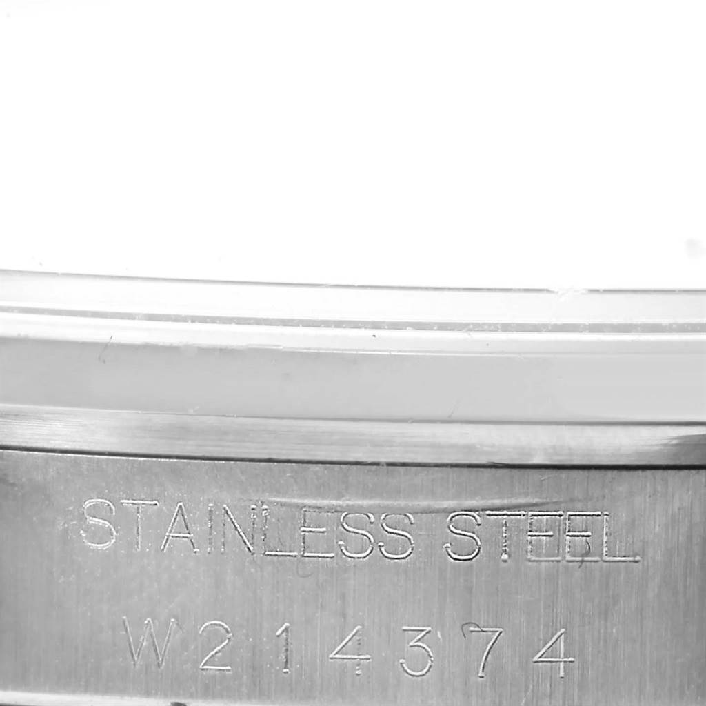 The image shows a close-up of the stainless steel case back with an engraving on a Rolex Date 15200 Men's Stainless Steel Blue Dial 15200 Men's Stainless Steel Blue Dial model watch.