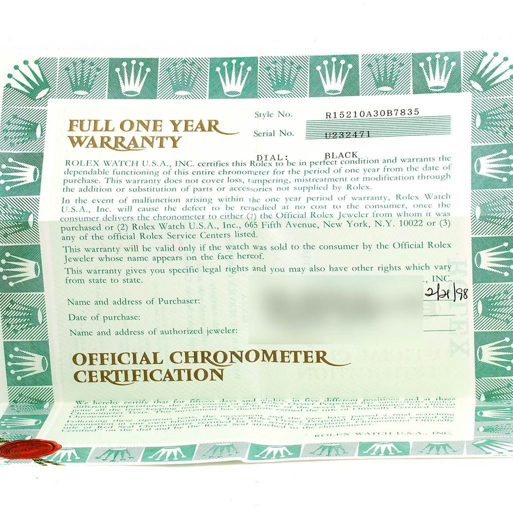The image shows the official chronometer certification and warranty card for a Rolex Date 15210 Men's Stainless Steel Black Dial 15210 Men's Stainless Steel Black Dial model watch.