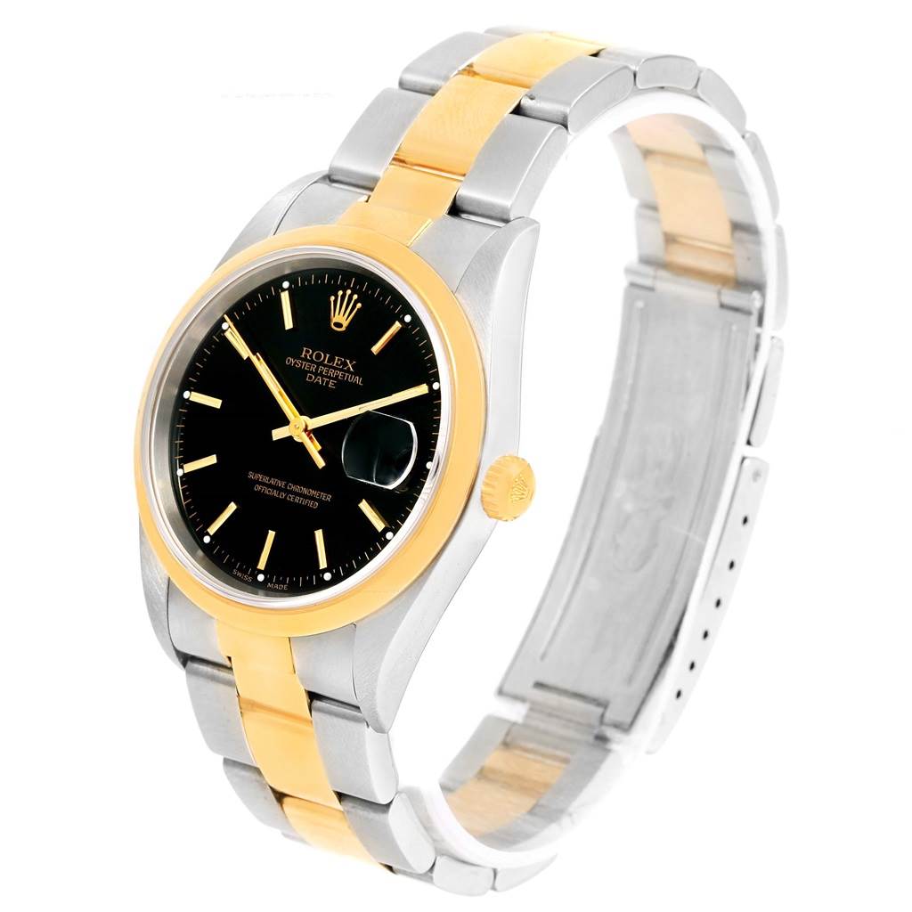 The image shows a gold and silver Rolex Date 15203 Men's Steel and Gold (two tone) Black Dial 15203 Men's Steel and Gold (two tone) Black Dial model watch at an angle displaying the face, bezel, bracelet, and clasp.