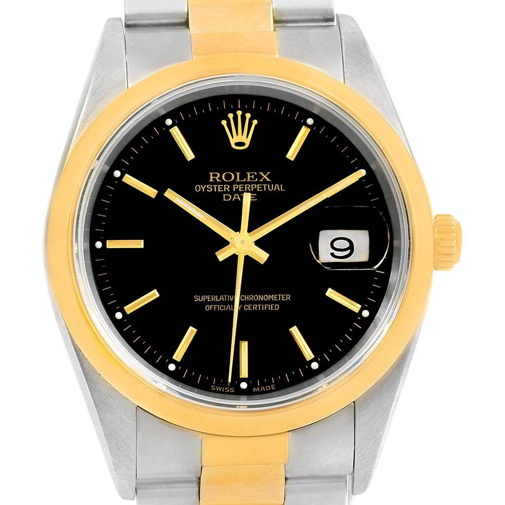 The image shows a front view of a Rolex Date 15203 Men's Steel and Gold (two tone) Black Dial 15203 Men's Steel and Gold (two tone) Black Dial model watch, highlighting its black dial, gold bezel, and stainless steel bracelet.