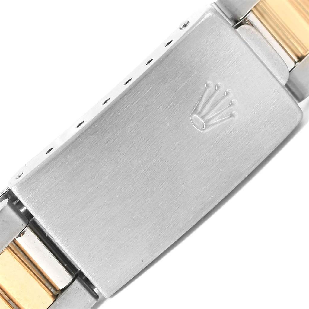 The image shows a close-up of the clasp and part of the bracelet of a Rolex Date 15203 Men's Steel and Gold (two tone) Black Dial 15203 Men's Steel and Gold (two tone) Black Dial model watch.