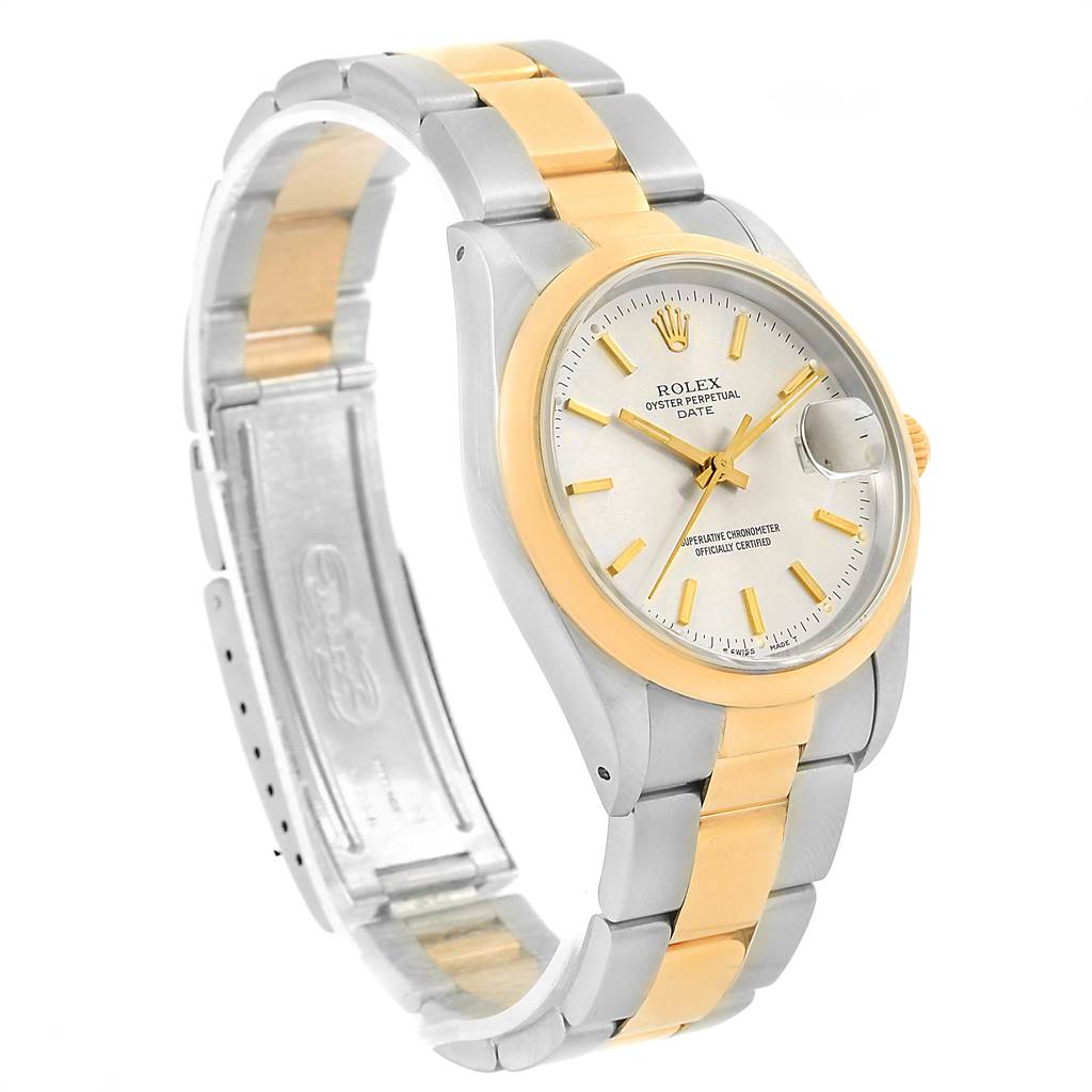 The image shows the Rolex Date 15203 Men's Steel and Gold (two tone) Silver Dial 15203 Men's Steel and Gold (two tone) Silver Dial model watch at a front-side angle, with the face, bezel, crown, and two-tone bracelet visible.