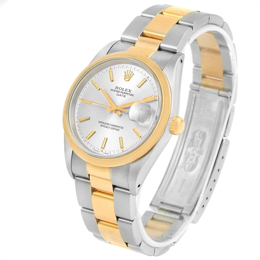 The image shows a Rolex Date 15203 Men's Steel and Gold (two tone) Silver Dial 15203 Men's Steel and Gold (two tone) Silver Dial model watch at a three-quarter angle, revealing the face, bezel, band, and crown.