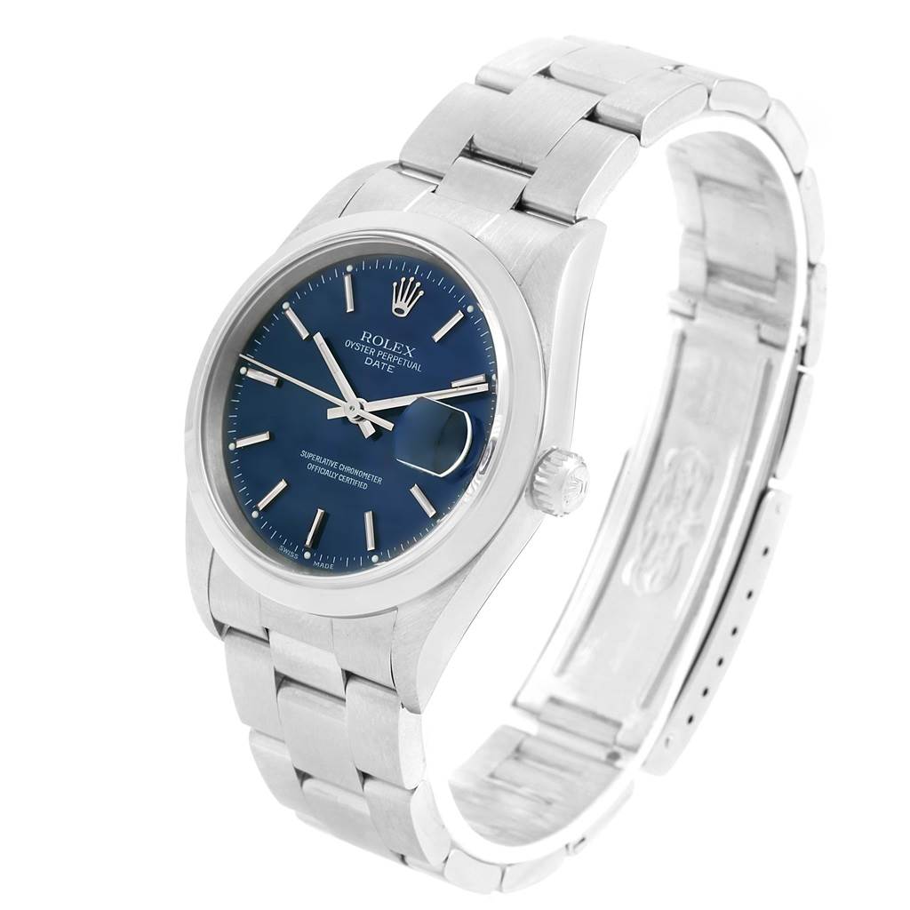 This image shows a Rolex Oyster Perpetual Date model watch from a three-quarter angle, highlighting its bracelet and dial.