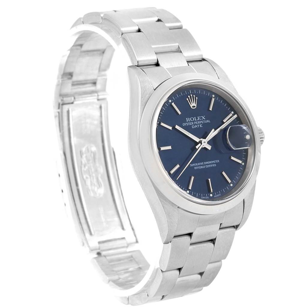 The image shows a tilted side view of a Rolex Date 15200 Men's Stainless Steel Blue Dial 15200 Men's Stainless Steel Blue Dial watch, highlighting the dial, bracelet, case, and partially open clasp.