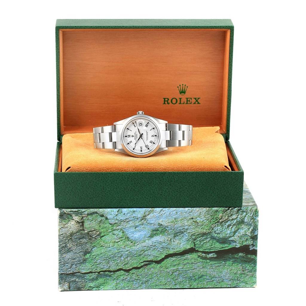 The Rolex Date 15200 Men's Stainless Steel White Dial 15200 Men's Stainless Steel White Dial watch is shown front-facing inside its branded green and orange box with the bracelet extended and dial visible.
