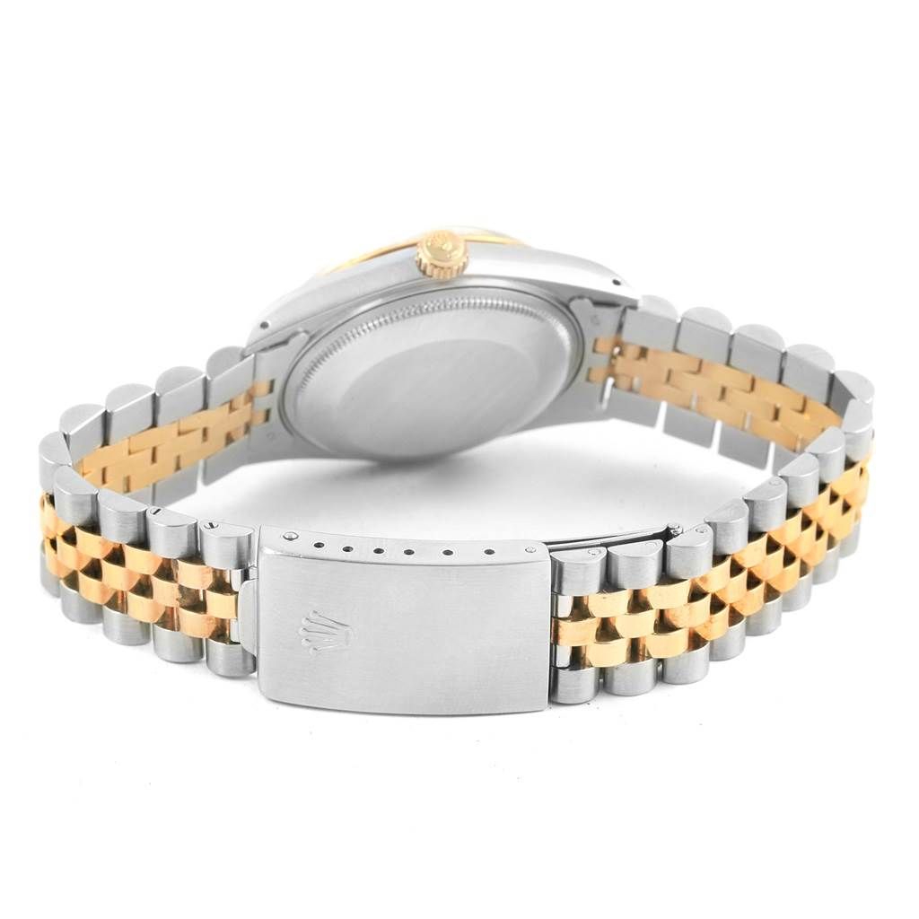 This image shows the rear view of the Rolex Date 15053 Men's Steel and Gold (two tone) White Dial 15053 Men's Steel and Gold (two tone) White Dial model watch, focusing on the closed case back and the two-tone bracelet clasp.