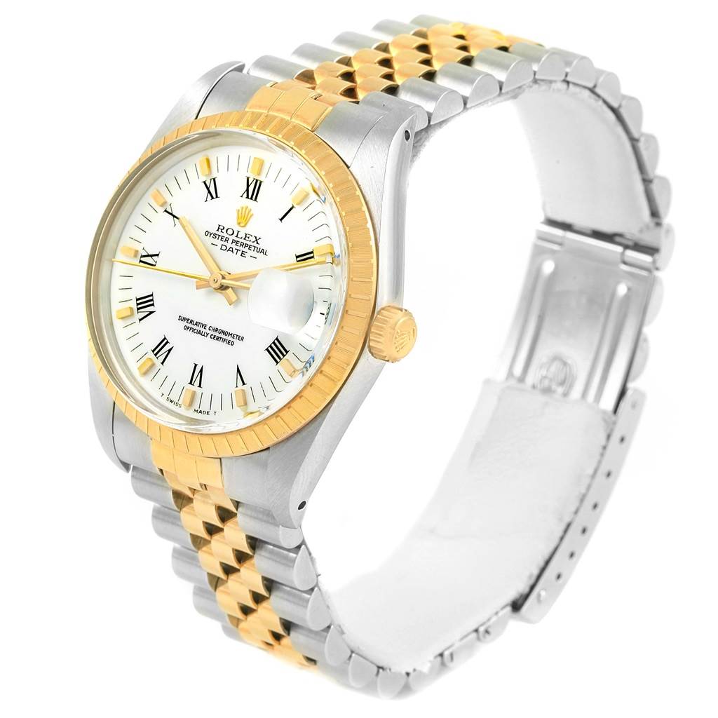 The image shows a Rolex Date 15053 Men's Steel and Gold (two tone) White Dial 15053 Men's Steel and Gold (two tone) White Dial model watch angled to display the face, bezel, crown, and part of the bracelet.