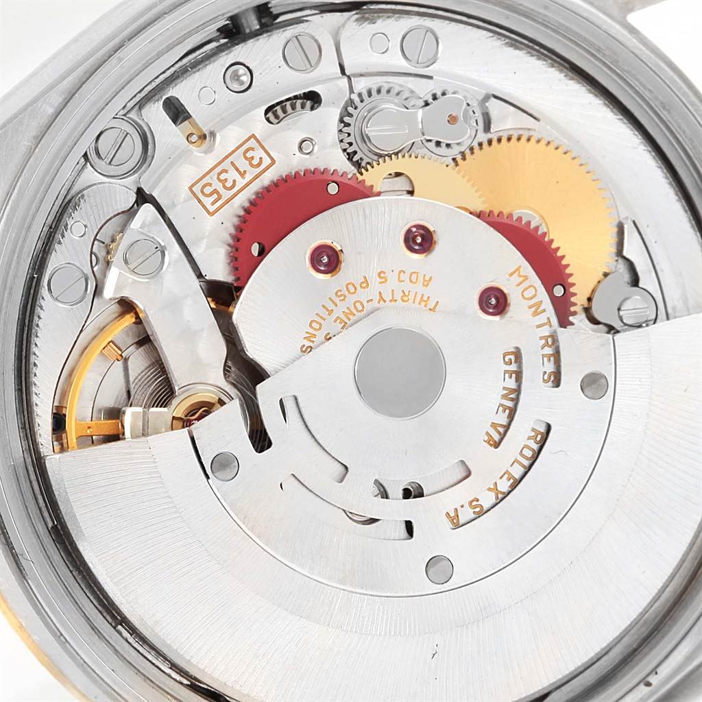 The image shows a close-up view of the internal mechanism of a Rolex Date 15223 Men's Steel and Gold (two tone) Champagne Dial 15223 Men's Steel and Gold (two tone) Champagne Dial model watch.