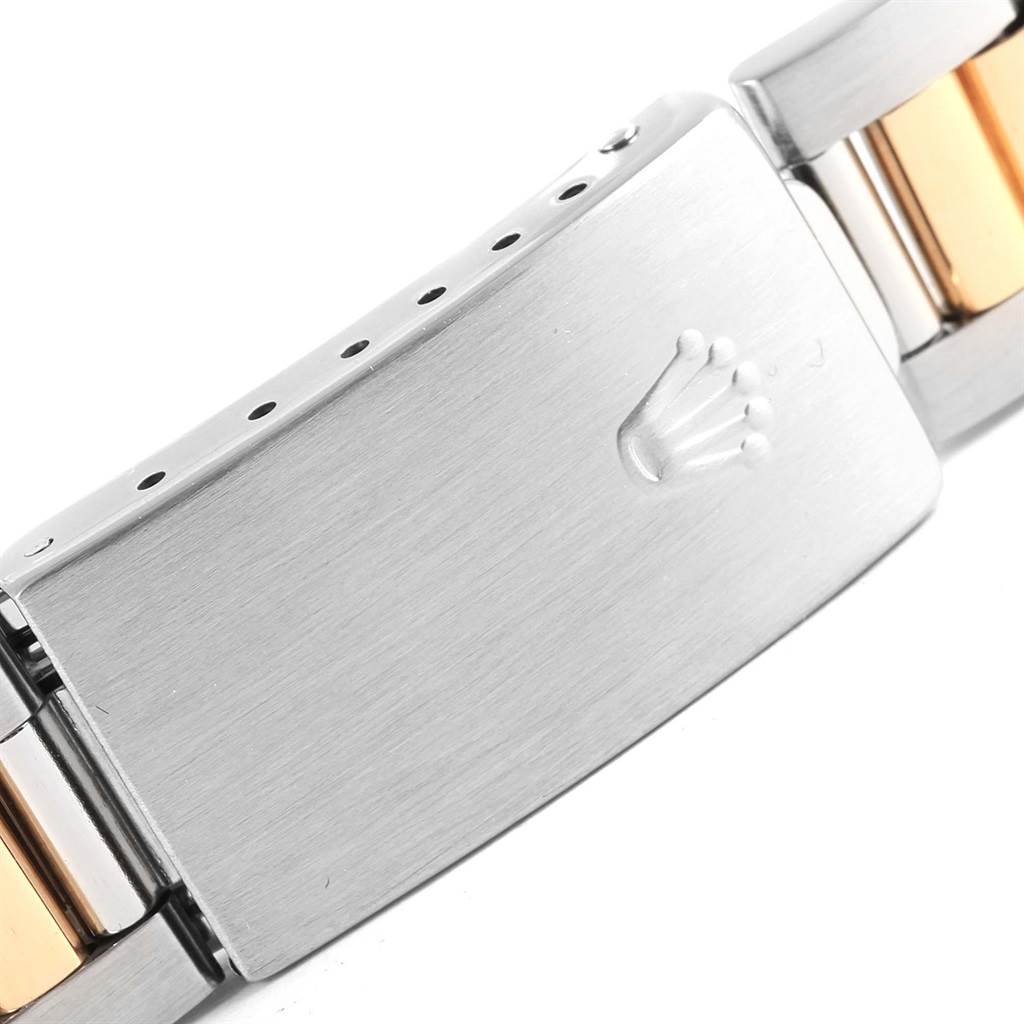 This image shows the clasp of a Rolex Date 15223 Men's Steel and Gold (two tone) Champagne Dial 15223 Men's Steel and Gold (two tone) Champagne Dial model watch from a close-up angle.