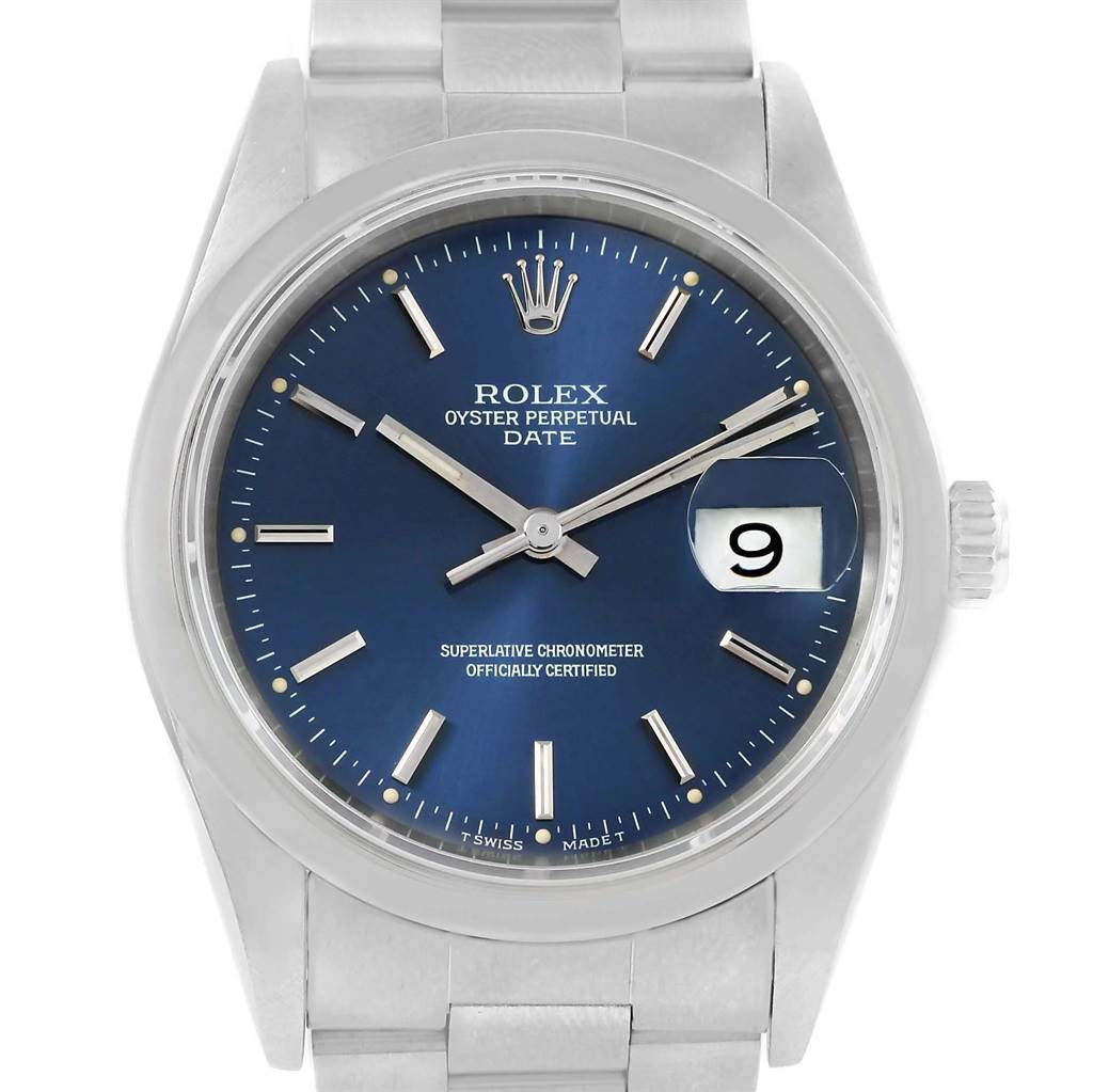The image shows a frontal view of a Rolex Oyster Perpetual Date model, highlighting the dial, hands, date window, and part of the bracelet.
