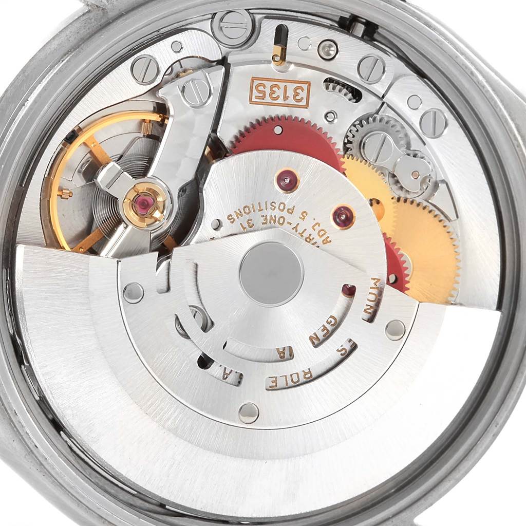 The image shows the intricate mechanism and internal components of a Rolex Date 15200 Men's Stainless Steel Blue Dial 15200 Men's Stainless Steel Blue Dial model watch from a rear angle.