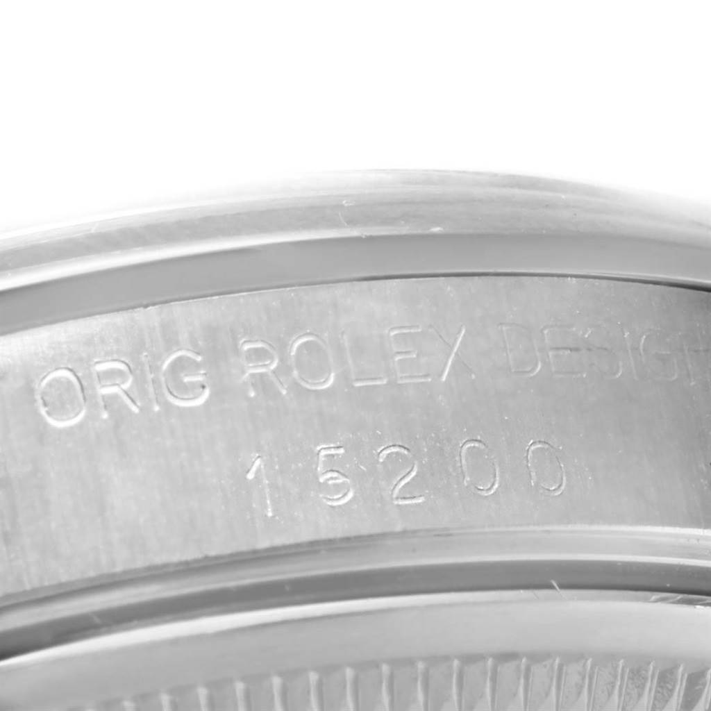 The image shows a close-up of the engraved model number on the caseback of a Rolex Date 15200 Men's Stainless Steel Blue Dial 15200 Men's Stainless Steel Blue Dial watch.
